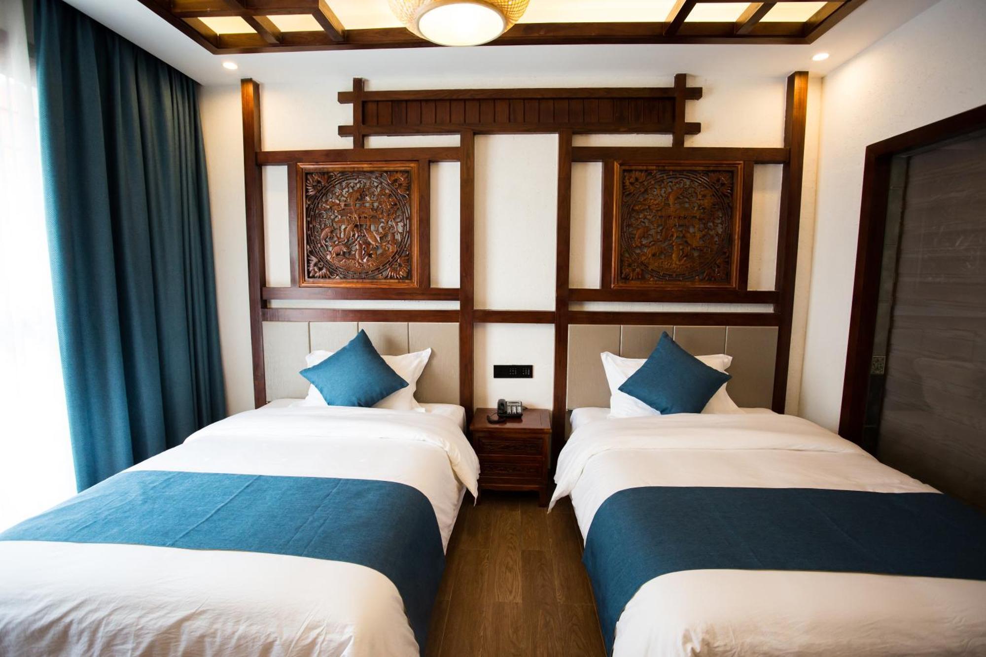 Appartement 一树一花客栈眷恋店 à Wulingyuan Extérieur photo