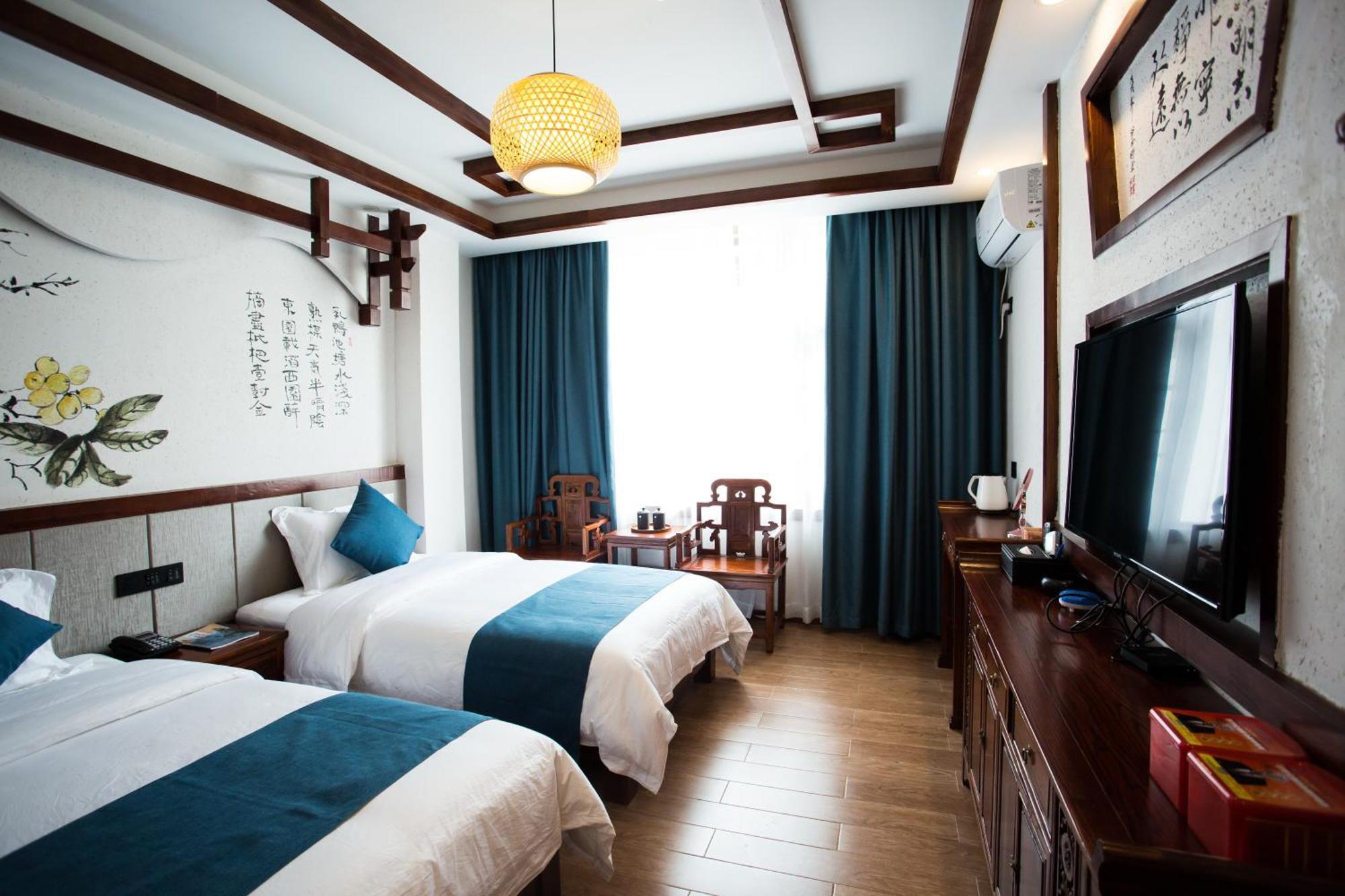Appartement 一树一花客栈眷恋店 à Wulingyuan Extérieur photo